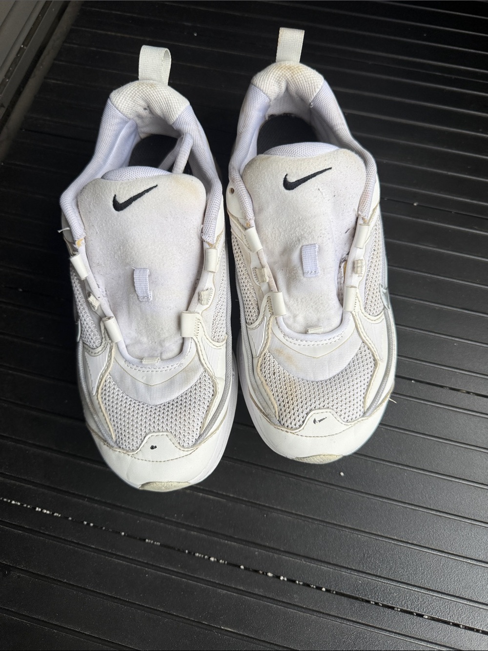Nike women’s off white and Black Slip-On Mesh Sneakers